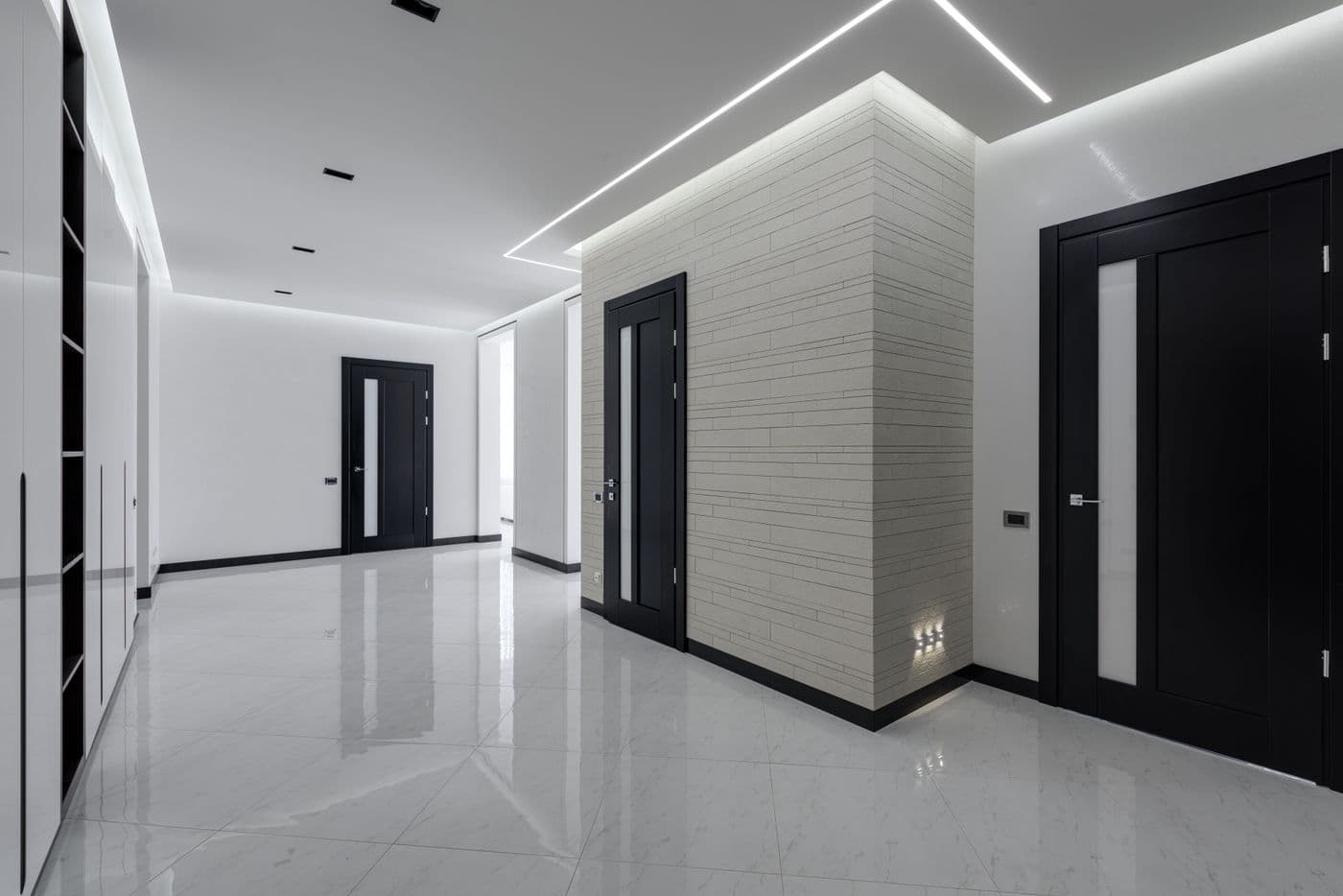 Modern hallway with integrated LED ceiling lighting